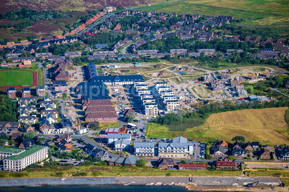 List from the bird's eye view: Construction site for the renovation and reconstruction of the building complex of the former military barracks List Duenenpark on street Querduenenpfad in List on the island of Sylt in the state Schleswig-Holstein, Germany