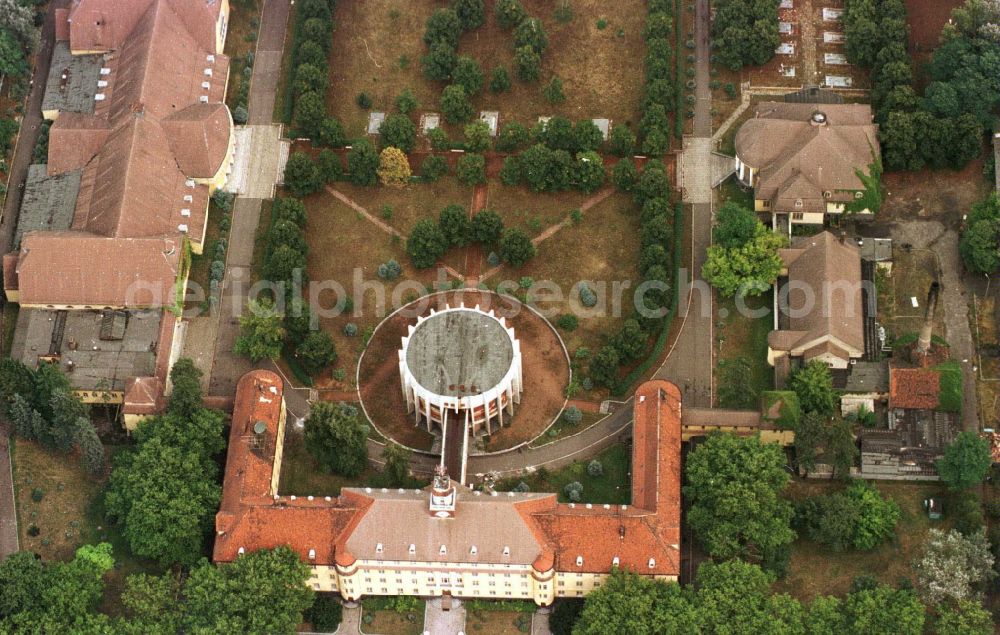 Zossen from the bird's eye view: Construction site for the renovation and reconstruction of the building complex of the former military barracks and terraced houses in Zossen in the state Brandenburg, Germany