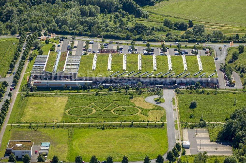 Aerial image Hamm - Eco-Center Hamm with a big bike in a meadow behind the OBI store in Hamm in North Rhine-Westphalia