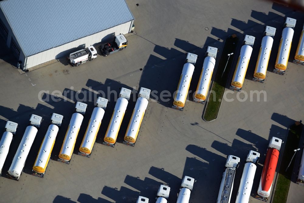 Aerial image Seefeld - Automotive parking- space with rows of parked truck tankers in Seefeld in Brandenburg