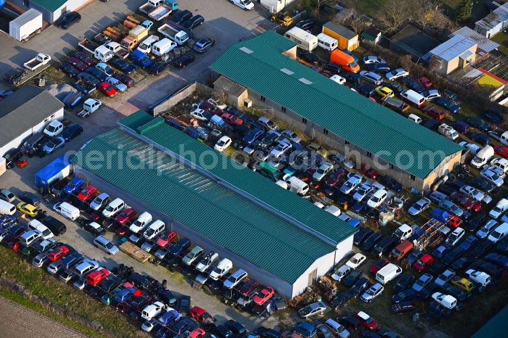 Aerial photograph Quellendorf - Scrapyard for recycling of cars cars and used vehicles with decomposition and aftermarket Autocenter Uhlendorf in Quellendorf in the state Saxony-Anhalt, Germany