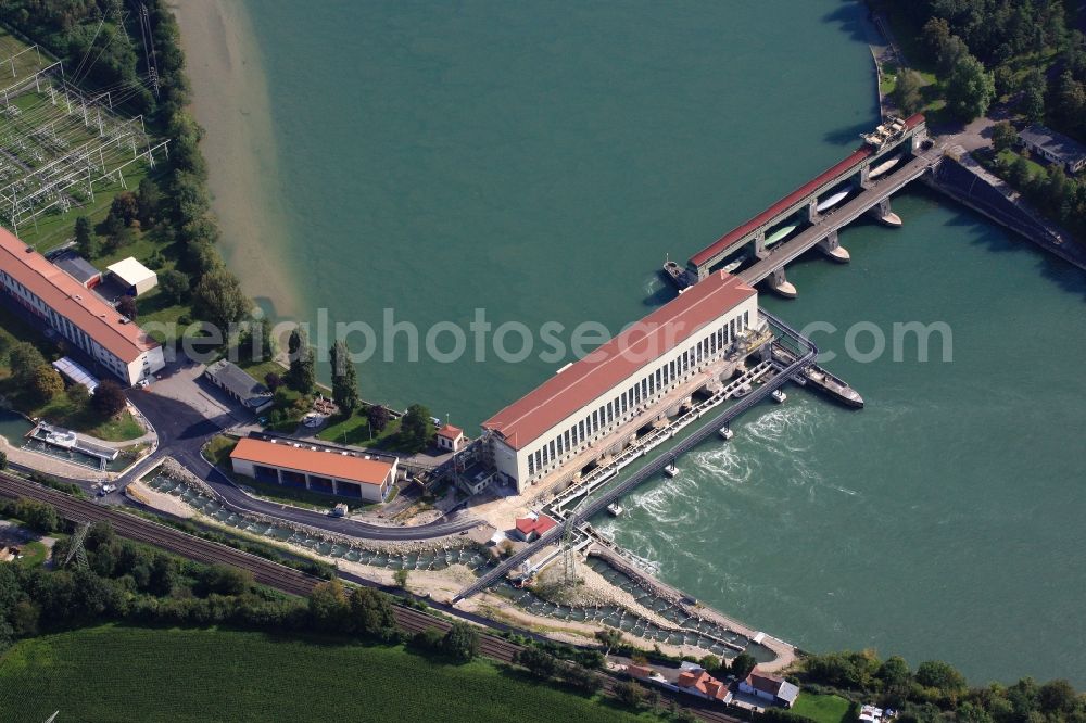 Aerial image Schwörstadt - The water power plant in Schwoerstadt in the state of Baden-Wuerttemberg at the Rhine river with its bypass channel used as fishway. The 1150 meter long fish ladder climbs a height of 9.5 meters between the lower and upper water at the dam