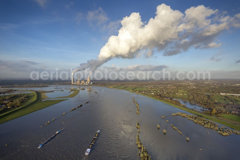 Dinslaken from the bird's eye view: View over the Rhine at Dinslaken on the chimneys with smoke pillar of Voerde power plant in the Ruhr area in North Rhine-Westphalia