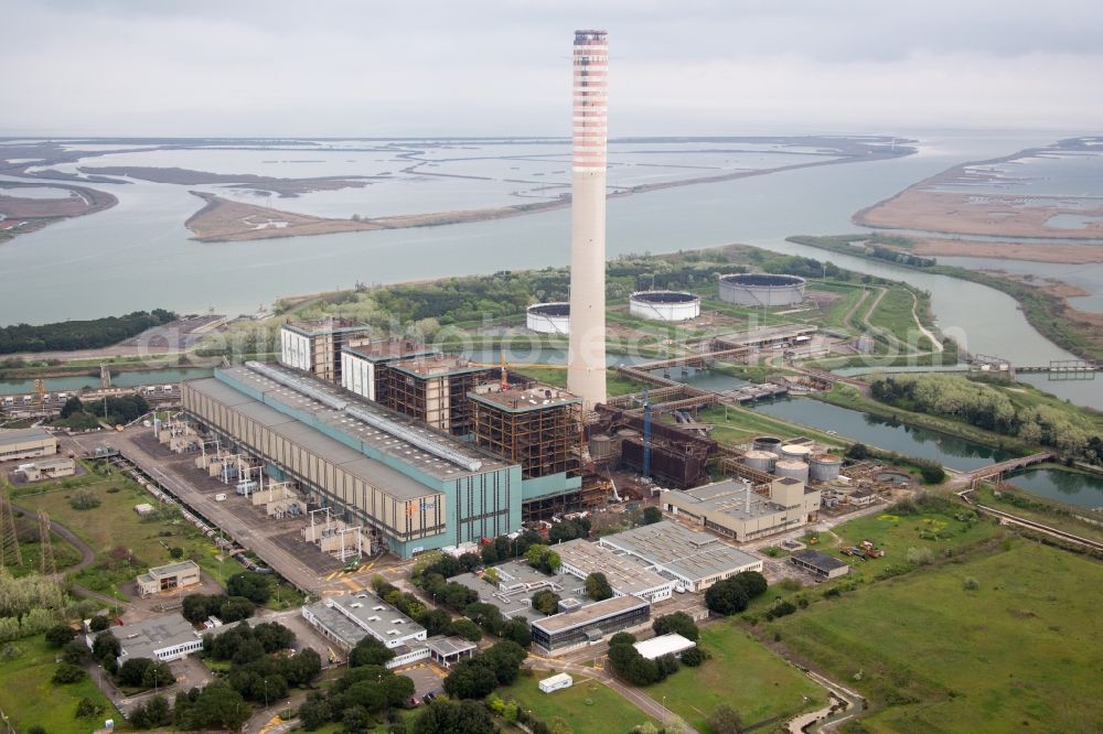 Centrale Enel from above - Power plants and exhaust towers of electrical power station at the mouth of river Po in Centrale Enel in Veneto, Italy