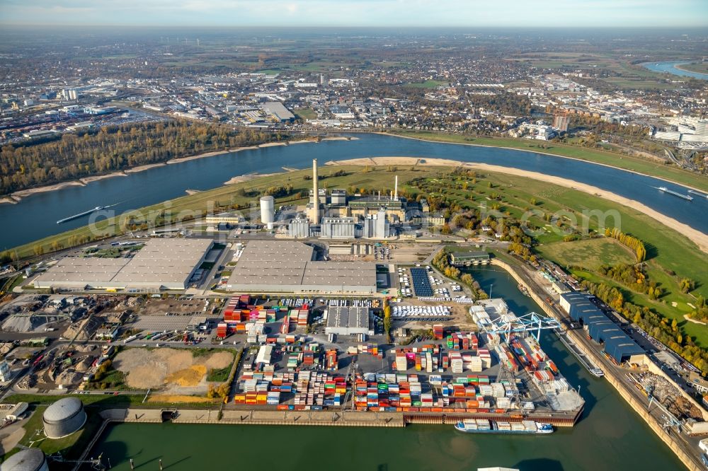 Düsseldorf from the bird's eye view: Power plants and exhaust towers of thermal power station Lausward of Stadtwerke Duesseldorf AG on rhine waterway port in Duesseldorf in the state North Rhine-Westphalia