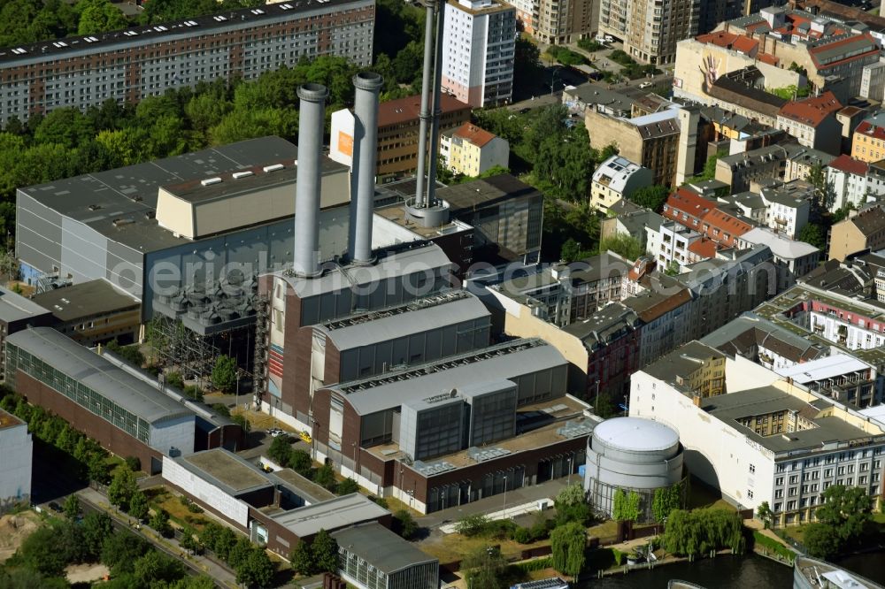 Berlin from the bird's eye view: Power plants and exhaust towers of the thermal power station Kraftwerk - Mitte and the event hall of the organizer Kraftwerk Berlin GmbH on Koepenicker Strasse in Berlin, Germany