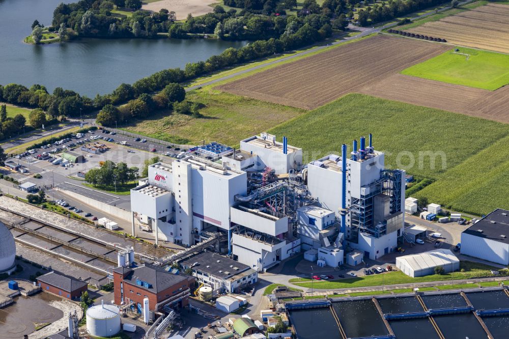 Krefeld from the bird's eye view: Power plant facilities of the combined heat and power plant of the waste incineration plant EGK Entsorgungsgesellschaft in Krefeld in the federal state of North Rhine-Westphalia, Germany