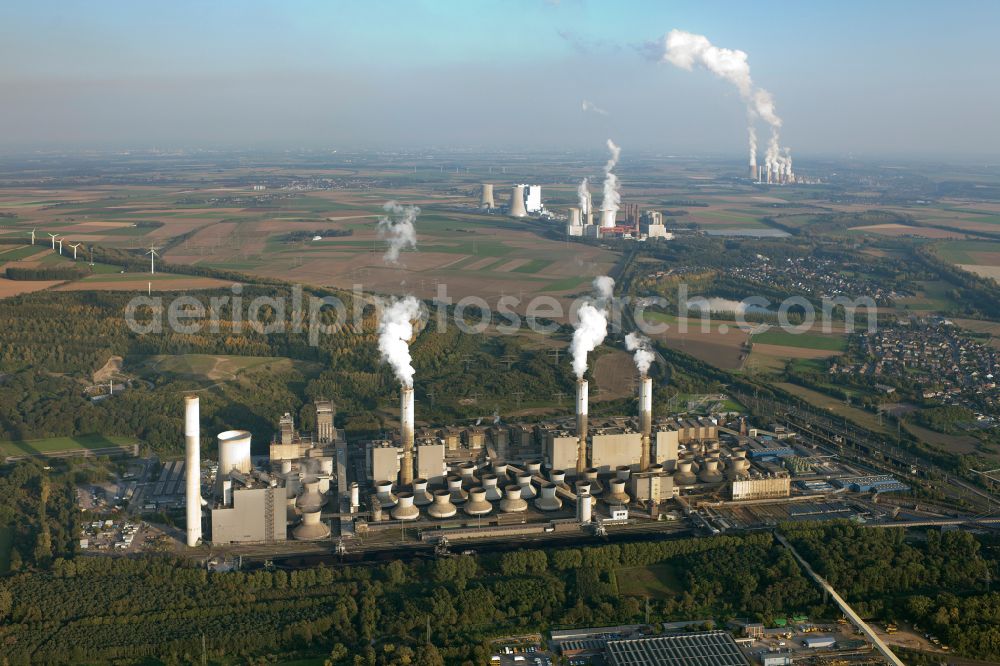 Aerial photograph Frimmersdorf - Power plants and exhaust towers of coal thermal power station on street Energiestrasse in Frimmersdorf at Ruhrgebiet in the state North Rhine-Westphalia, Germany