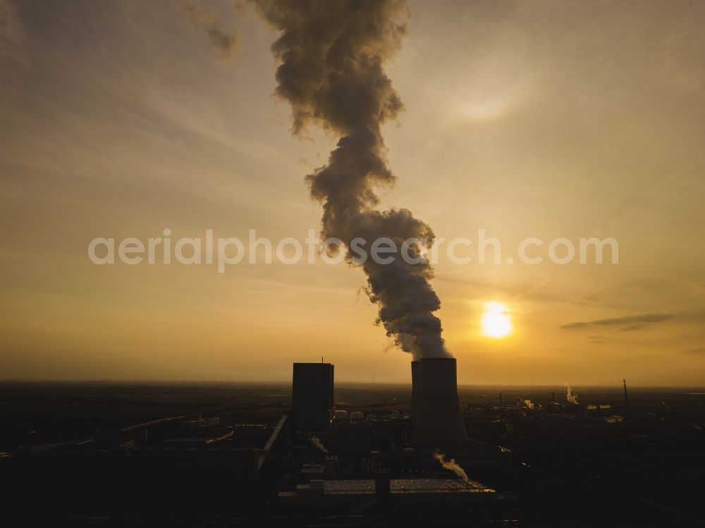 Lippendorf from the bird's eye view: Power plants and exhaust gas towers of the combined heat and power plant of the LEAG Lausitz Energie Kraftwerke AG - Kraftwerk Lippendorf in Lippendorf in the state Saxony, Germany