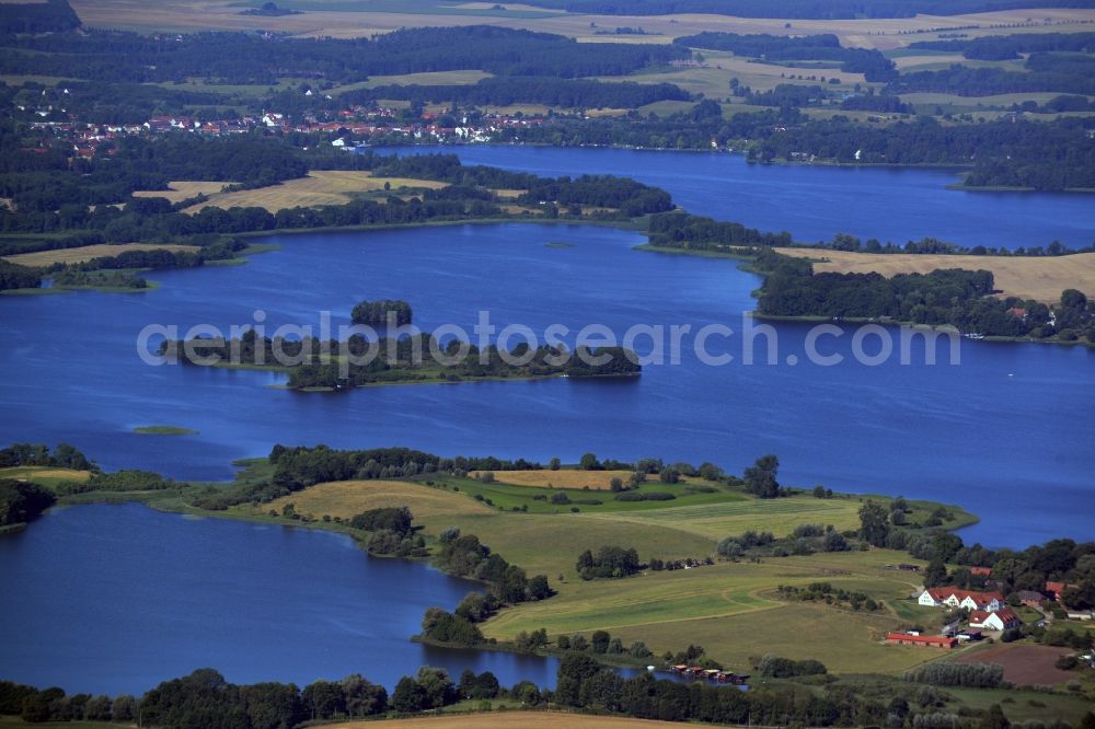 Aerial image Krakow am See - Krakow Lake District in Krakow am See in the state of Mecklenburg - Western Pomerania. The landscape consists of several lakes and islands such as the small Serrahner See in the foreground and Krakow Untersee with the Liepse Island in the background