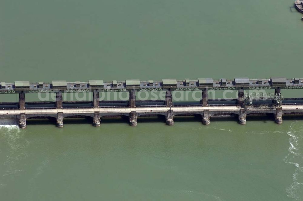 Aerial photograph BASEL - Die Rechenreinigungsmaschine entfernt das Schwemmgut des Rheins vom Rechen und sorgt so für einen freien Wasserzufluss zu den Turbinen. Homepage Kraftwerk Augst: http://