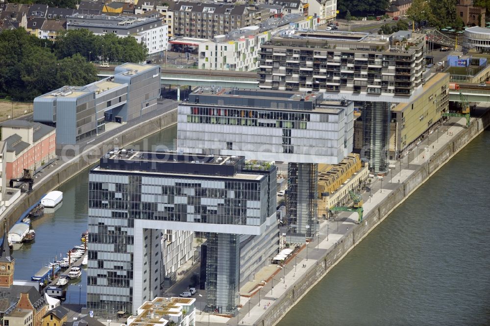 Köln from the bird's eye view: View of the finished crane buildings at Cologne Rheinauhafen in the state of North Rhine-Westphalia. The design of these offices and commercial buildings by architects BRT Bothe Richter Teherani. The roofs were made of the VEDAG GmbH