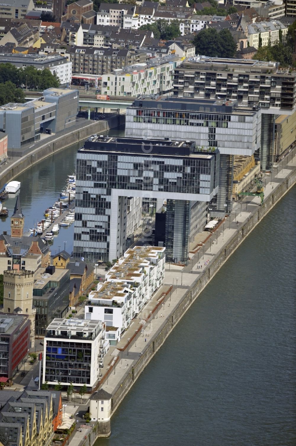 Aerial photograph Köln - View of the finished crane buildings at Cologne Rheinauhafen in the state of North Rhine-Westphalia. The design of these offices and commercial buildings by architects BRT Bothe Richter Teherani. The roofs were made of the VEDAG GmbH