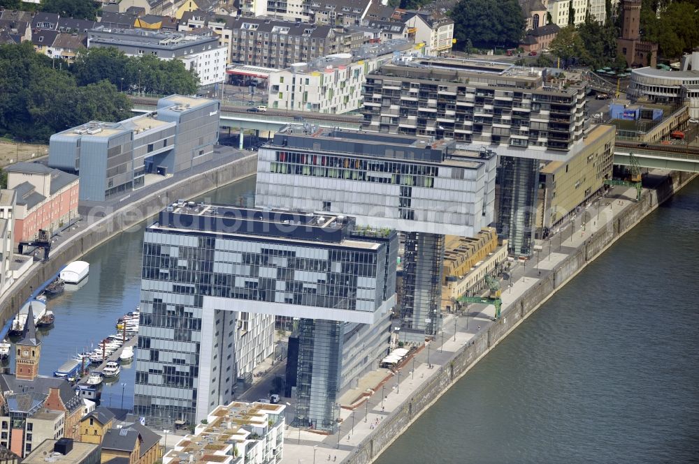 Köln from the bird's eye view: View of the finished crane buildings at Cologne Rheinauhafen in the state of North Rhine-Westphalia. The design of these offices and commercial buildings by architects BRT Bothe Richter Teherani. The roofs were made of the VEDAG GmbH