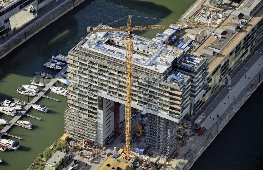 Aerial image Köln - Blick auf die Baustelle der Kranhäuser am Kölner Rheinauhafen. Die Bürogebäude sind alle ca. 60 Meter hoch, 34 Meter breit und haben eine Länge von 70 Metern. Entworfen wurden sie vom Architekturbüro BRT Bothe Richter Teherani. View of the construction site of the Kran Houses on Rheinauhafen. The office buildings are all about 60 feet high, 34 meters wide and have a length of 70 meters. They were designed by architects BRT Bothe Richter Teherani.