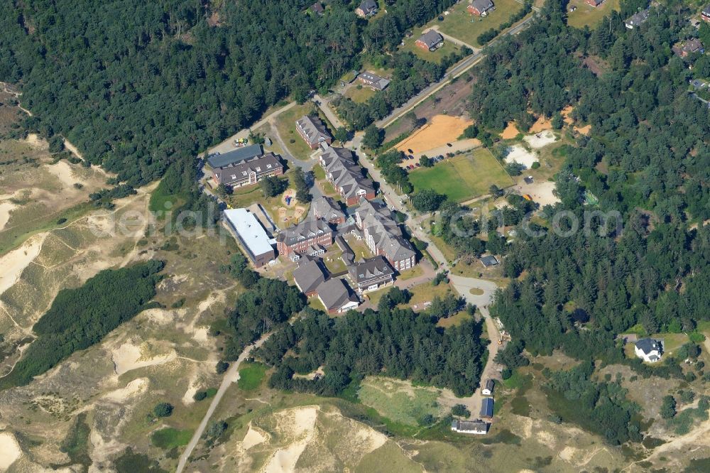 Nebel from the bird's eye view: Clinic of the hospital grounds Sattelduene surrounded by woods in Nebel in the state Schleswig-Holstein