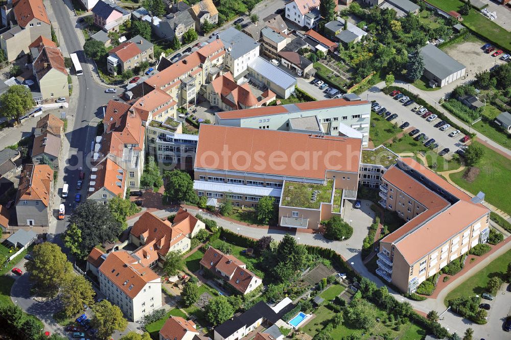 Aerial photograph Guben - Blick auf das örtliche Krankenhaus Naemi-Wilke-Stift in Guben. 1887 wurde es vom wohlhabenden Hutmacher Friedrich Wilke zur Erinnerung an seine an Typhus verstorbene Tochter als Kinderkrankenhaus gestiftet. View of the local hospital Naomi-Wilke-Stift in Guben. 1887, it was founded as a children hospital by the the wealthy hatter Friedrich Wilke in memory of his deceased daughter who died of typhus.