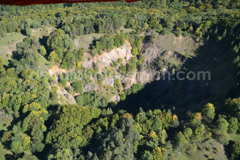 Aerial photograph Hammelburg - Crater of a disused Quarry for the mining and handling of Basaltstein on Sodenberg in Hammelburg in the state Bavaria