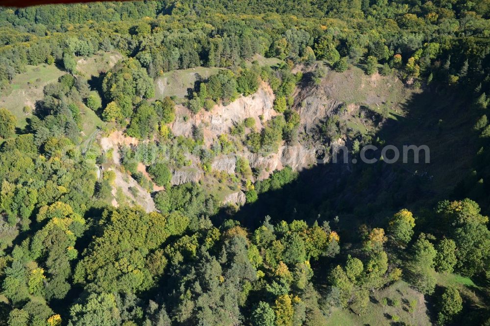 Hammelburg from above - Crater of a disused Quarry for the mining and handling of Basaltstein on Sodenberg in Hammelburg in the state Bavaria