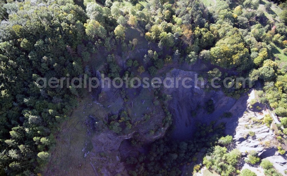 Aerial photograph Hammelburg - Crater of a disused Quarry for the mining and handling of Basaltstein on Sodenberg in Hammelburg in the state Bavaria