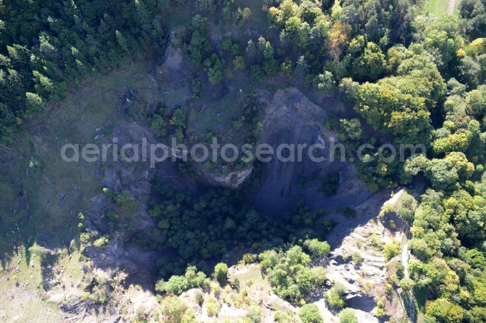 Hammelburg from the bird's eye view: Crater of a disused Quarry for the mining and handling of Basaltstein on Sodenberg in Hammelburg in the state Bavaria