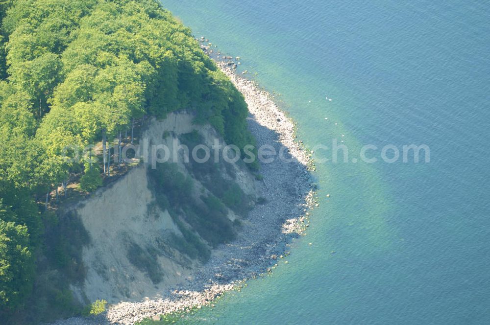 Halbinsel Jasmund from the bird's eye view: Blick auf die Kreidefelsen Steilküste. Im Nordosten der Halbinsel Jasmund auf Rügen erstreckt sich auf rund fünfzehn Kilometer Länge zwischen Sassnitz und Lohme die Kreidefelsen-Steilküste. Teilweise bis 120 Meter ragen die Kreidefelsen empor. Der bekannteste und meistbesuchteste unter ist ein Felsvorsprung mit dem Namen Königsstuhl, der sich etwa 10 km von Sassnitz entfernt befindet.