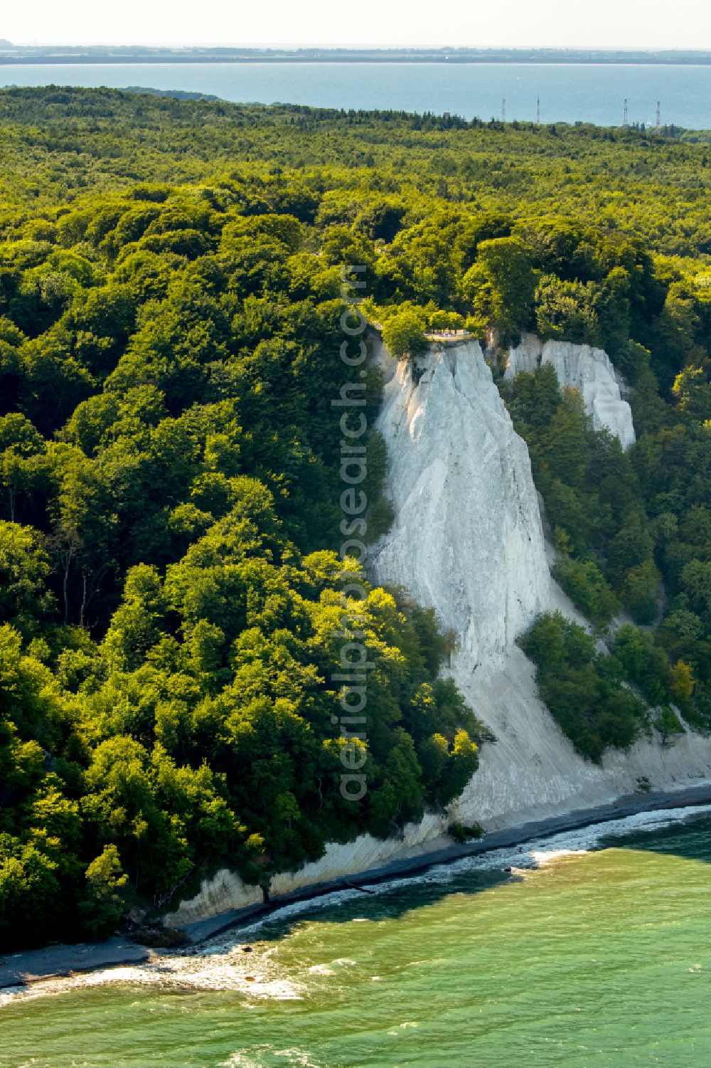 Stubbenkammer from above - Wooded chalk cliffs and cliff landscape in the Jasmund National Park on the cliffs on the Baltic Sea in Stubbenkammer on the island of Ruegen in the state Mecklenburg-West Pomerania, Germany