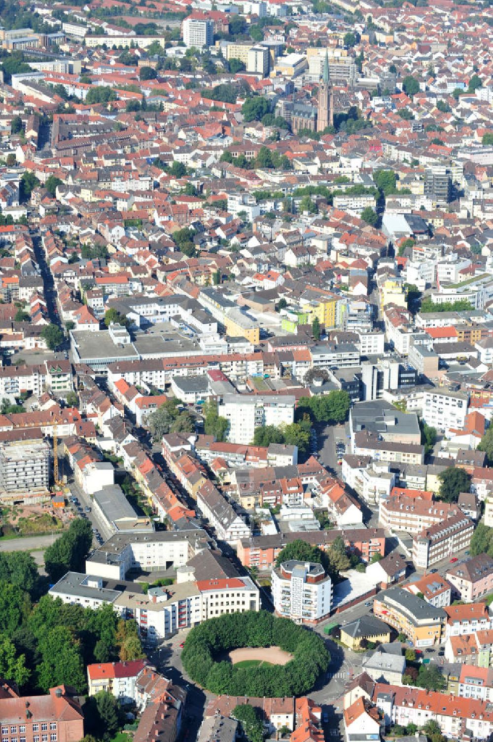 Aerial image Kaiserslautern - The Adolph Kolping square is the only rotary traffic in the inenr city of Kaiserslautern. It was named after the katholic priest and founder of the Kolpingwerk. The square is surrounded by high broad-leafed trees