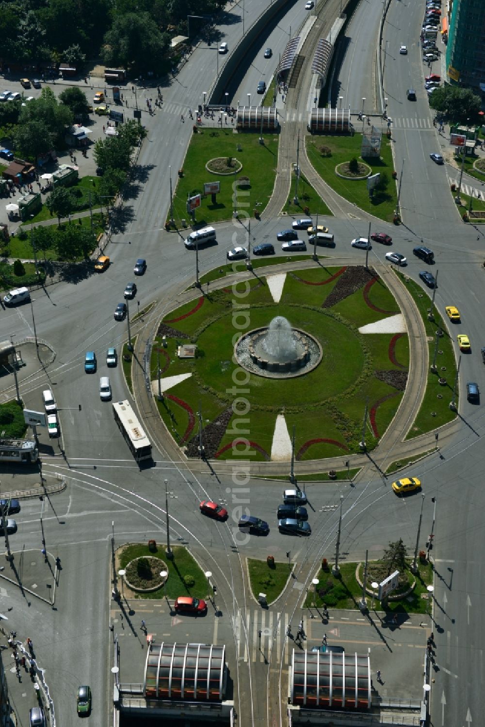 Bukarest from the bird's eye view: Roundabout fountains in the square Piata Obor in Bucharest, Romania