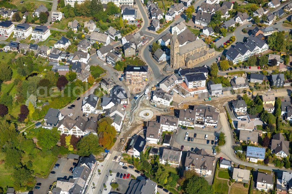 Olsberg from the bird's eye view: Traffic management of the roundabout road on Bahnhofstrasse - Huettenstrasse in Olsberg in the state North Rhine-Westphalia, Germany