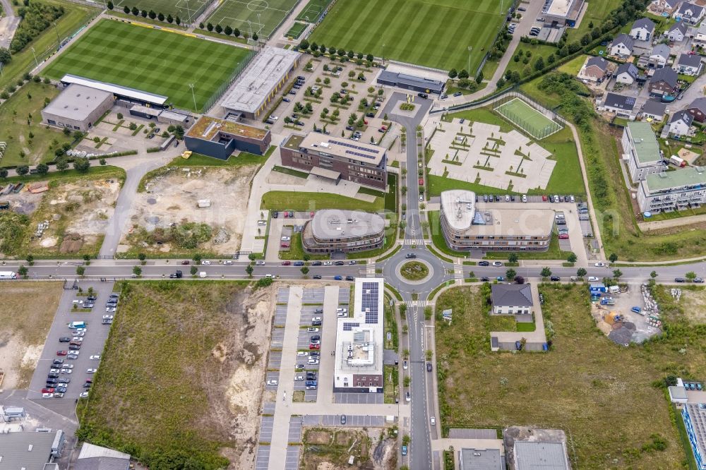 Aerial image Dortmund - Traffic management of the roundabout road in the industrial estate on Saint-Barbara-Allee - Adi-Preissler-Allee - Hohenbuschei-Allee in the district Brackeler Feld in Dortmund at Ruhrgebiet in the state North Rhine-Westphalia, Germany