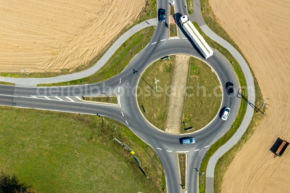 Voerde (Niederrhein) from the bird's eye view: Traffic management of the roundabout road of Grenzstrasse - Hammweg in Voerde (Niederrhein) in the state North Rhine-Westphalia, Germany