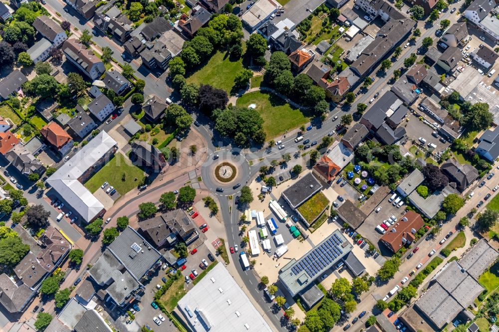 Beckum from the bird's eye view: Traffic management of the roundabout road on Gustav-Moll-Strasse - Hauptstrasse - Martin-Luther-Strasse in the district Neubeckum in Beckum in the state North Rhine-Westphalia, Germany