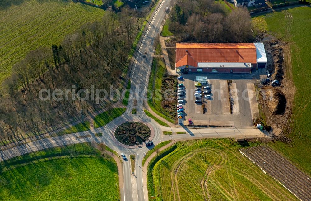 Aerial image Isselburg - Traffic management of the roundabout road mit Heckenemblem Breels - Hahnerfeld in Isselburg in the state North Rhine-Westphalia