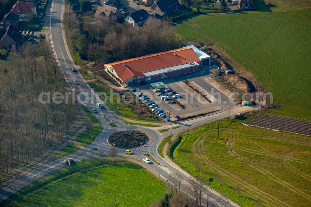 Aerial image Isselburg - Traffic management of the roundabout road mit Heckenemblem Breels - Hahnerfeld in Isselburg in the state North Rhine-Westphalia