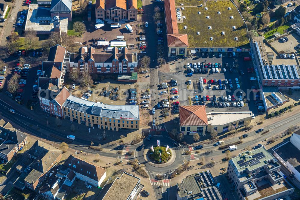 Selm from the bird's eye view: Traffic management of the roundabout road Kreisstrasse - Botzlarstrasse in Selm in the state North Rhine-Westphalia, Germany