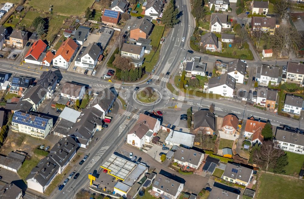 Holzwickede from the bird's eye view: Traffic management of the roundabout road of Lichtendorfer Strasse - Schwerter Strasse - Unnaer Strasse - Massener Strasse in Holzwickede in the state North Rhine-Westphalia, Germany