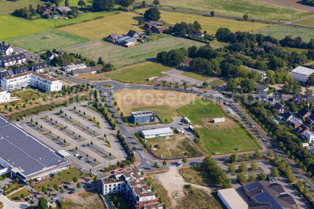 Aerial image Osterath - Traffic management of the roundabout road on street Winklerweg in Osterath in the state North Rhine-Westphalia, Germany