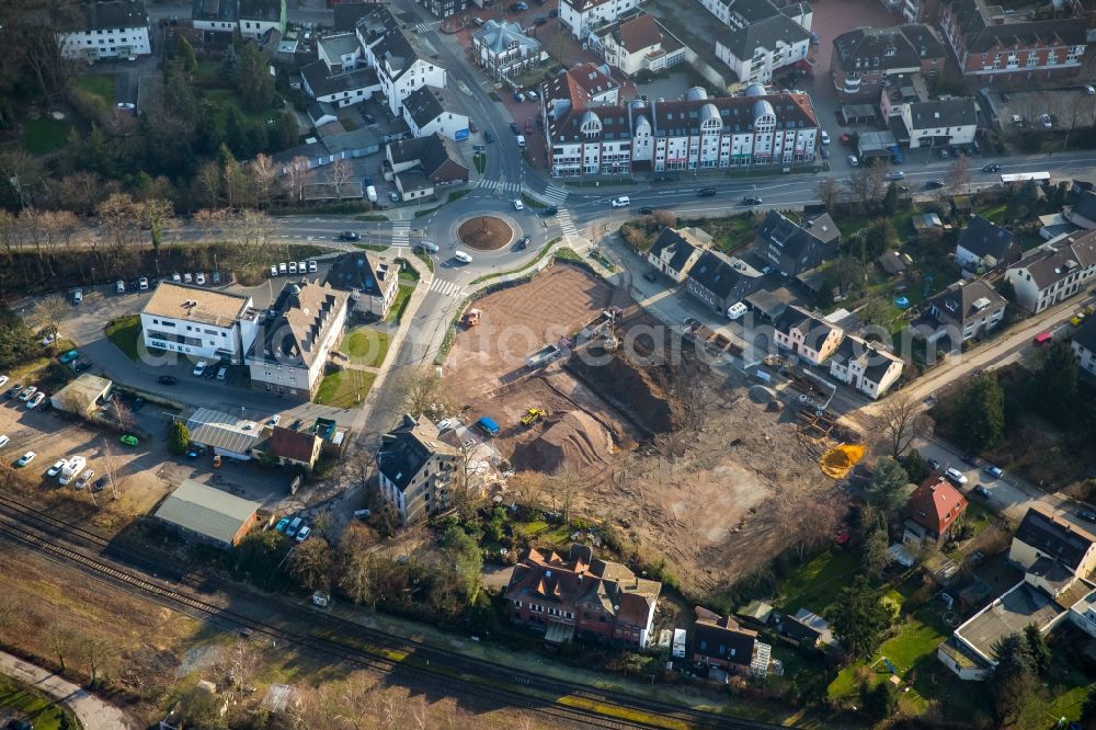 Witten from the bird's eye view: Roundabout - road of Pferdebachstrasse the former clay court in Witten in North Rhine-Westphalia. In addition, the construction site to build a new Edeka market. The client is the company Dortmunder three properties