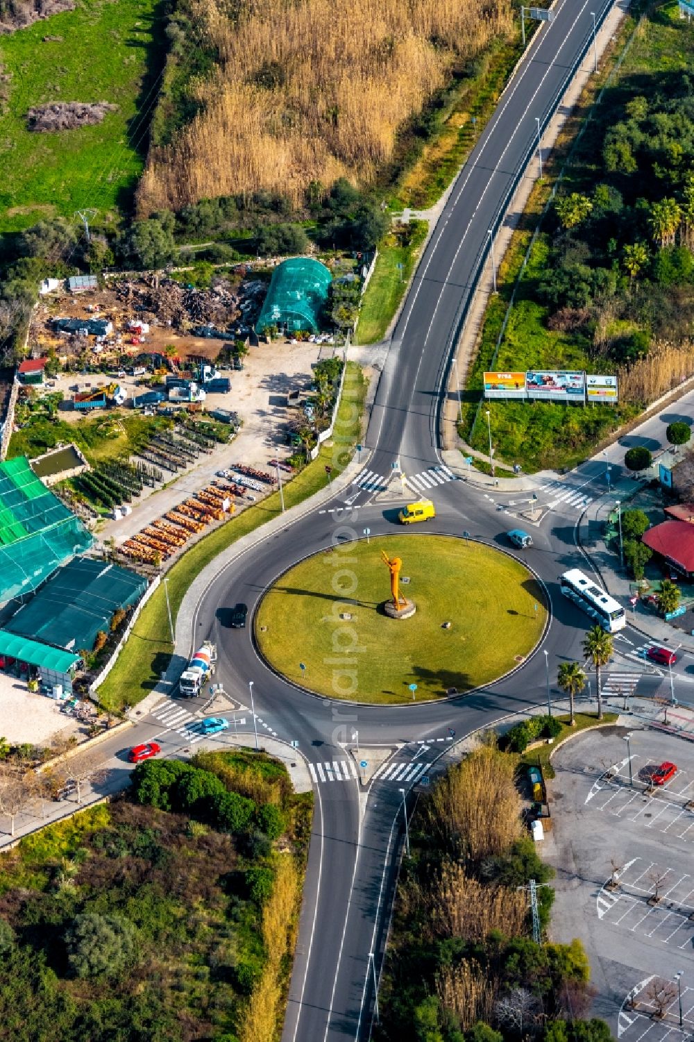 Aerial image Alcudia - Traffic management of the roundabout road of Via de Corneli Atic - Avinguda de la Platja - de AlcA?dia al Puerto overlooking the sculpture Rotonda del caballo in Alcudia in Balearische Insel Mallorca, Spain