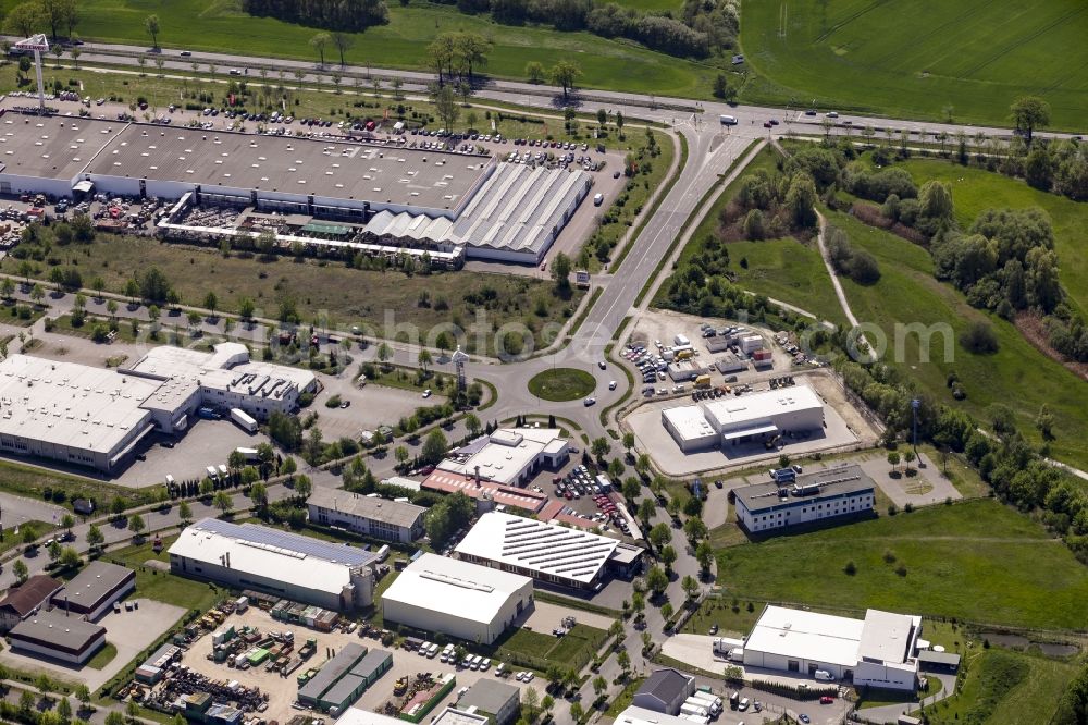 Hoppegarten from above - Roundabout in the industrial estate and company settlement on Handwerkerstrasse in Hoppegarten in the state of Brandenburg