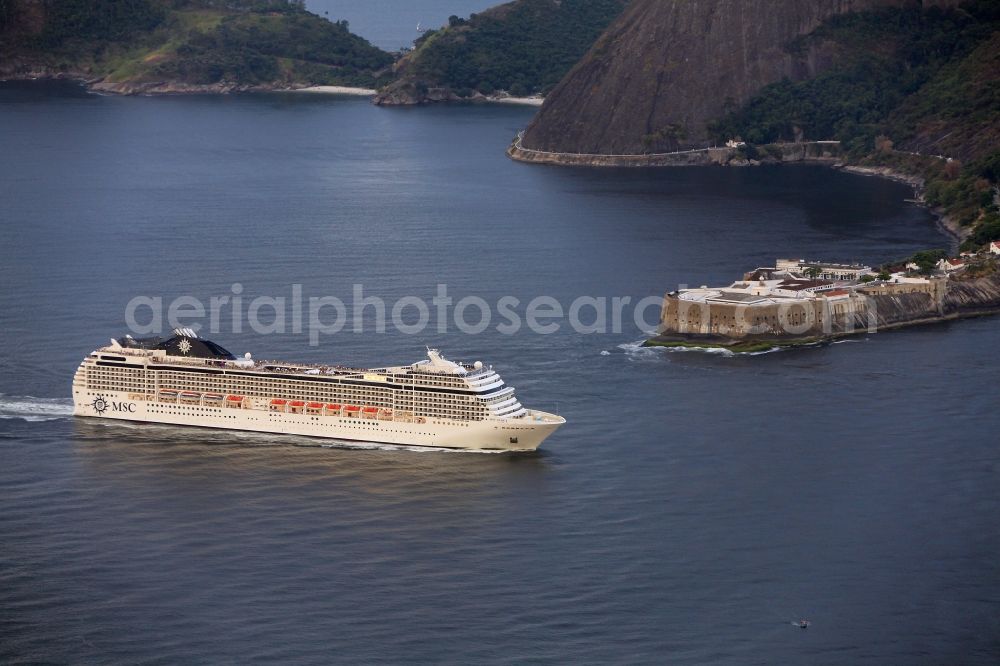 Aerial image Rio de Janeiro - Cruise - Ship MSC Musica before Fortaleza Santa Cruz da Barra on the coast of Rio de Janeiro in Brazil