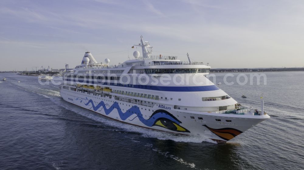 Rostock from above - Cruise and passenger ship AidaAura in mission of baltic sea in the district Warnemuende in Rostock at the baltic sea coast in the state Mecklenburg - Western Pomerania, Germany