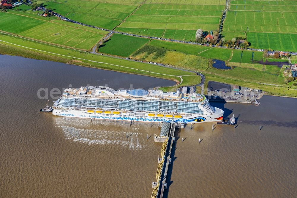 Aerial image Moormerland - Cruise and passenger ship AIDAcosma bei of Jungfernfahrt auf of Emsueberfuehrung in Moormerland in the state Lower Saxony, Germany