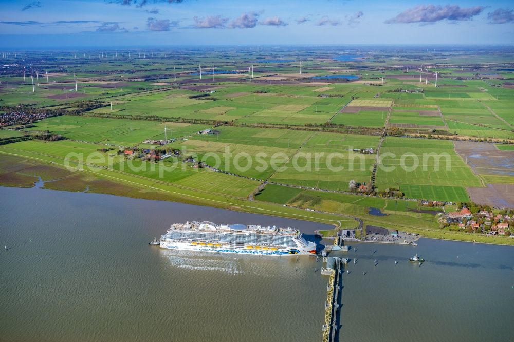 Aerial photograph Moormerland - Cruise and passenger ship AIDAcosma bei of Jungfernfahrt auf of Emsueberfuehrung in Moormerland in the state Lower Saxony, Germany