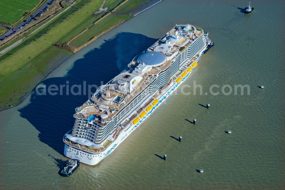 Moormerland from above - Cruise and passenger ship AIDAcosma bei of Jungfernfahrt auf of Emsueberfuehrung in Moormerland in the state Lower Saxony, Germany