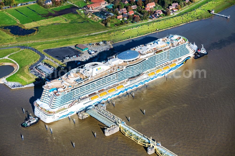 Aerial image Moormerland - Cruise and passenger ship AIDAcosma bei of Jungfernfahrt auf of Emsueberfuehrung in Moormerland in the state Lower Saxony, Germany