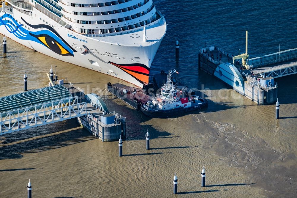 Moormerland from the bird's eye view: Cruise and passenger ship AIDAcosma bei of Jungfernfahrt auf of Emsueberfuehrung in Moormerland in the state Lower Saxony, Germany