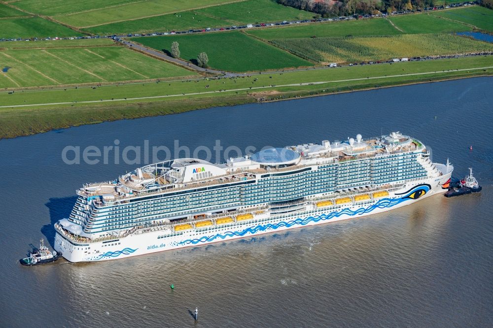 Aerial image Moormerland - Cruise and passenger ship AIDAcosma bei of Jungfernfahrt auf of Emsueberfuehrung in Moormerland in the state Lower Saxony, Germany