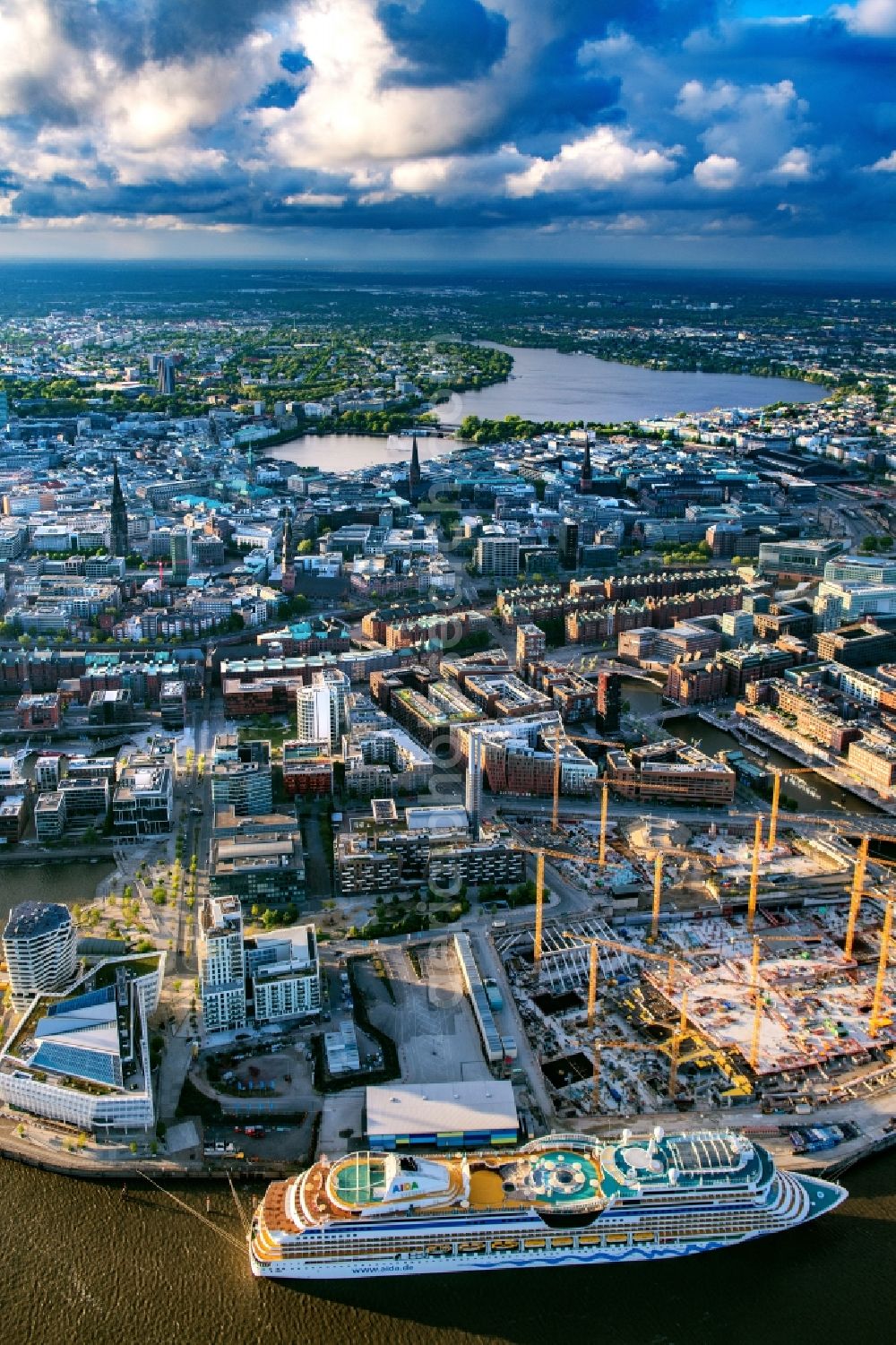 Aerial image Hamburg - Cruise and passenger ship of Aida at the port in the district HafenCity in Hamburg, Germany